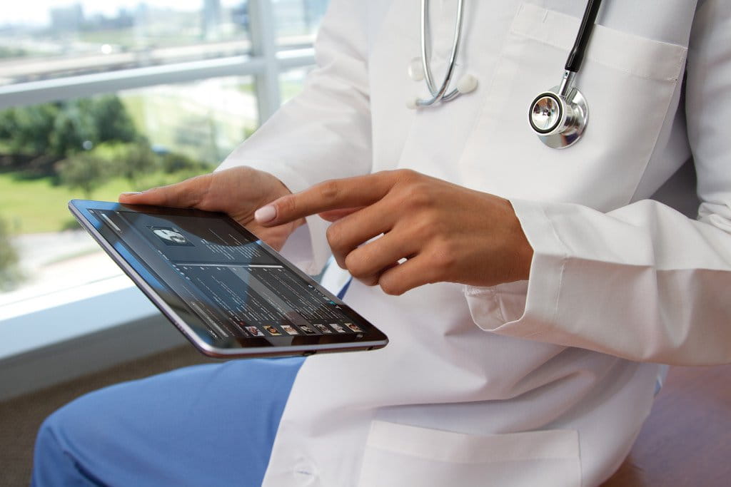 Doctor on tablet